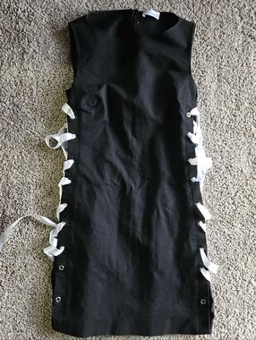 RedValentino Black Garment with White Lace-Up Sides